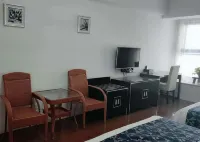 Guan County Hong Pu Traders Hotel