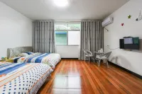 Beiqi Tantu Seaside Hostel - 2 ดาว