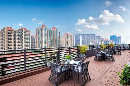 Zhuhai platinum union Auman Holiday Inn (Sports Center store) Отели рядом с достопримечательностью «Putuo Temple»