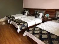 Zhanyou Jiayuan Nongjia Xiaoyuan Inn Hotel in zona Grass Sea Bridge