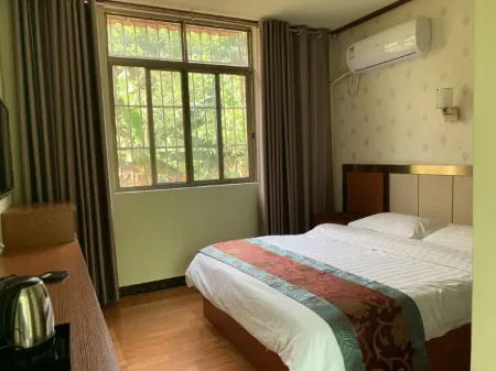 Menghai Yaju Hotel Отели рядом с достопримечательностью «Daluo Town»