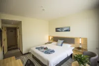 Tuwo Holiday Hotel (Yingshan bus station store) - Parkering