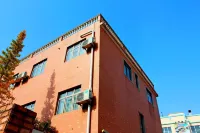 Manni Fei Holiday Hotel Hotels near Dijie Commercial Building