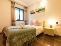 重庆斯维登服务公寓(解放碑大唐诺亚) - 珊瑚粉主题大床套房