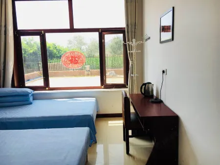 Wave Valley Danxia Jinyu Farmhouse Отели рядом с достопримечательностью «The Wave Valley Scenic Area»