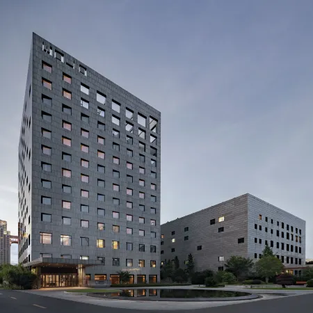 Xinchang Wozhou Junyi Hotel