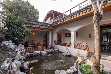 Yunlu Atrium Xixiangli Homestay (Kunshan Jinxi Branch) Отели рядом с достопримечательностью «Jinxi Town»