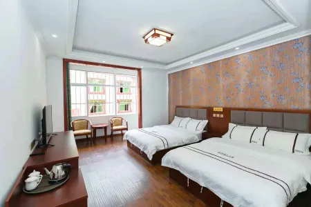 Fengqiong Hotel Отели в г. Сиаоцзинь