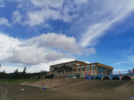 Heishawan Seaview Holiday Hotel Отели рядом с достопримечательностью «Taishan Cape City Holiday Resort Center»