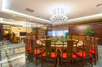 Huamei Party's Conflux Hotel Hoteles en Dandong