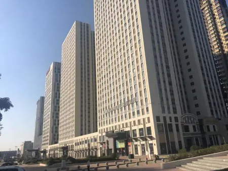 Lanshe ImpressionApartment (Siping Wanda Plaza) Отели в г. Сыпин