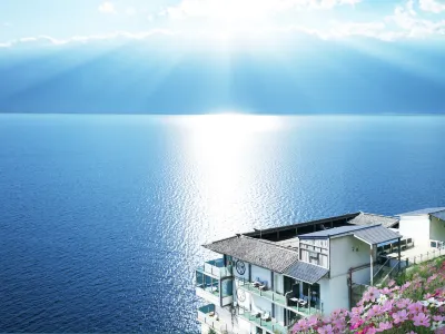 Zhenmei Holiday Hostel (Dali Erhai Cliff Lake View) Восточная часть живописной местности озера Эрхай: отели
