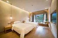Manqigu Hotel - Inns