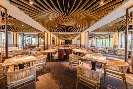 Xichang Guanhai Tingtao Art Hotel Отели рядом с достопримечательностью «Guanniaodao Wetland Park»