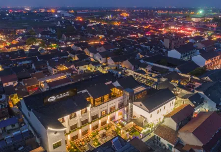 Chengshang Shijia Hotel Отели рядом с достопримечательностью «Wolong Bridge»