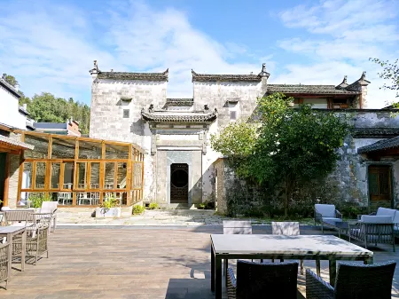 Nanxiangzi Xifu Yinju Hotel Отели рядом с достопримечательностью «Guzhang Folklore Garden»