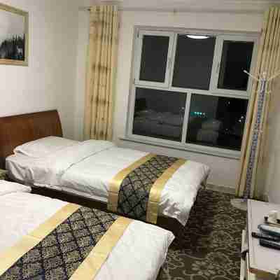 Konggang Home Family Hotel Rooms