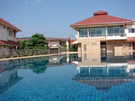 Pimann Inn Hotel Отели рядом с достопримечательностью «The Navel City Pillar of Chiang Rai»