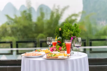 Lihua Chen's Garden Hotel Отели рядом с достопримечательностью «Xingping Wharf»