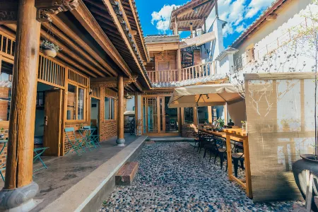 Xishanju Inn Отели в г. Цзянчуань