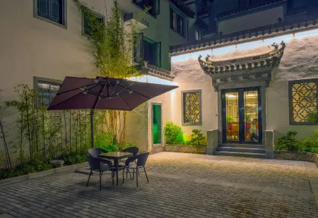 Gusse Hotel (Huangshanyi County Huizhou Ancient City Branch) Отели в г. Шэсянь