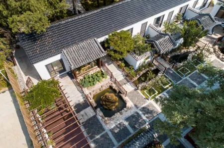 Floral Hotel · Plum Garden Mount Tai hotel Отели рядом с достопримечательностью «Shandong Science and Technology University East Campus»