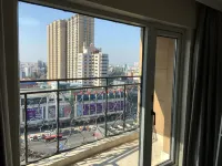 Qiqihar Mingshi Apartment - Condos