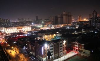 Sweetome Boutique Apartment (Qingdao Central Business District Dunhua Road Subway Station)