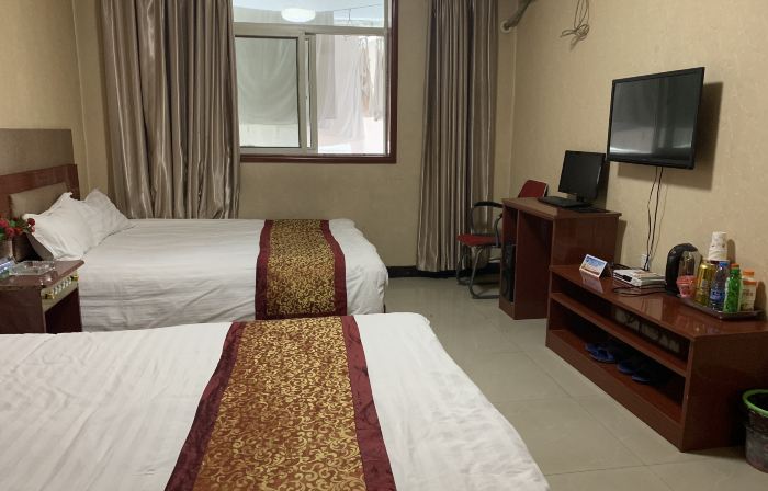 Zhouqu Home Inn Business Hotel