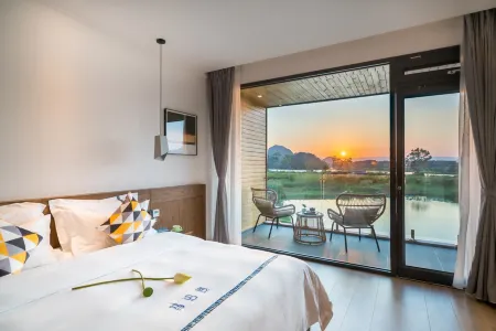 Puyuman Lake View Inn Отели рядом с достопримечательностью «Fairy Cave»