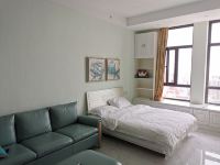 桔子酒店式公寓(哈尔滨银泰店) - 温馨舒适特大床房
