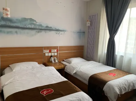 Shankee Express Hotel (Qin'an Bus Station) Отели в г. Цинань