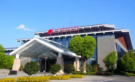 Kejia New Century Hotel Отели в г. Шанхан