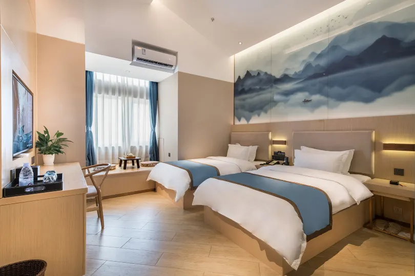 Chongqing Chaomu Collection Hotel (Banan Wanda Xuetangwan Subway Station)