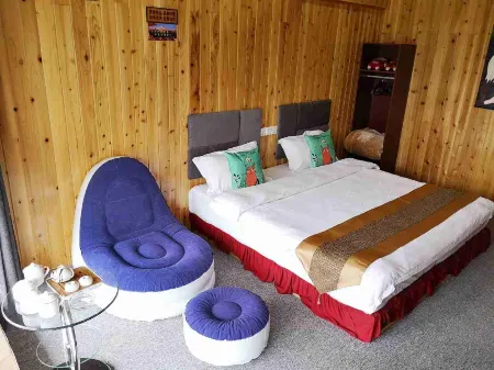 Yubeng impression boutique inn Отели рядом с достопримечательностью «Xiaonong Base camp»
