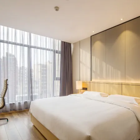 Leyizhu Hotel (Guangzhou Jiahe Wanggang Metro Station Jinbo Plaza Branch) Отели рядом с достопримечательностью «Байюнь»