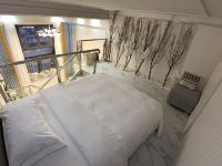 雪域公寓(广州花都融创万达店) - 精选复式大床房