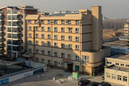 Longkou Holiday (Longkou Hotel Tower B) Отели рядом с достопримечательностью «Huangcheng Ancient City»