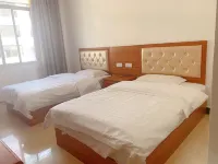 Mengla Jiuzhou Hotel - 2 Sao