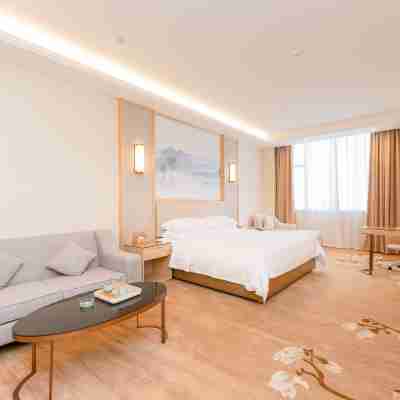 維也納國際酒店（廉江大道鑫源國際廣場店） Rooms