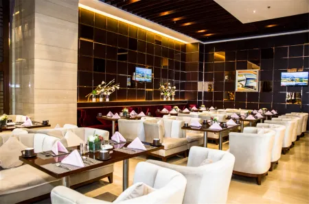 Hiyonda International Business Hotel Отели рядом с достопримечательностью «Baoding Zoo»