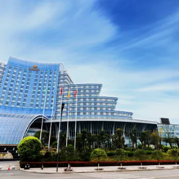 Haoweiyi International Hotel Hotels near Shiwaitaoyuan (Paradise) Scenic Area