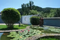 SunshineKeep Hotels in der Nähe von Temple of Universal Happiness (Pule si)