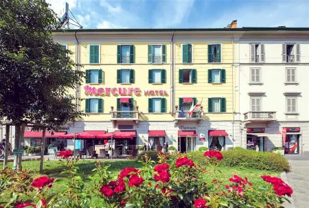 Sercotel Alfonso XIII Отели рядом с достопримечательностью «Escultura de Carlos III»