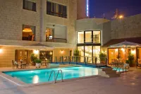 Amman International Hotel - สระว่ายน้ำบนดาดฟ้า