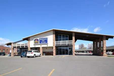 Dinosaur Inn & Suites Отели в г. Винта Каунти