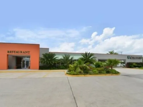 Motel 6 la Place, La