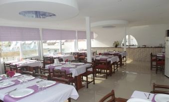 Kozan Hotel - Housity