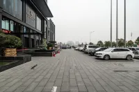 Xinzheng Xingangwanhua Hotel - Parkplatz
