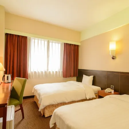 LA HOTEL Liuhe Fusing Отели рядом с достопримечательностью «НКНУ - Хэпин Кампус»